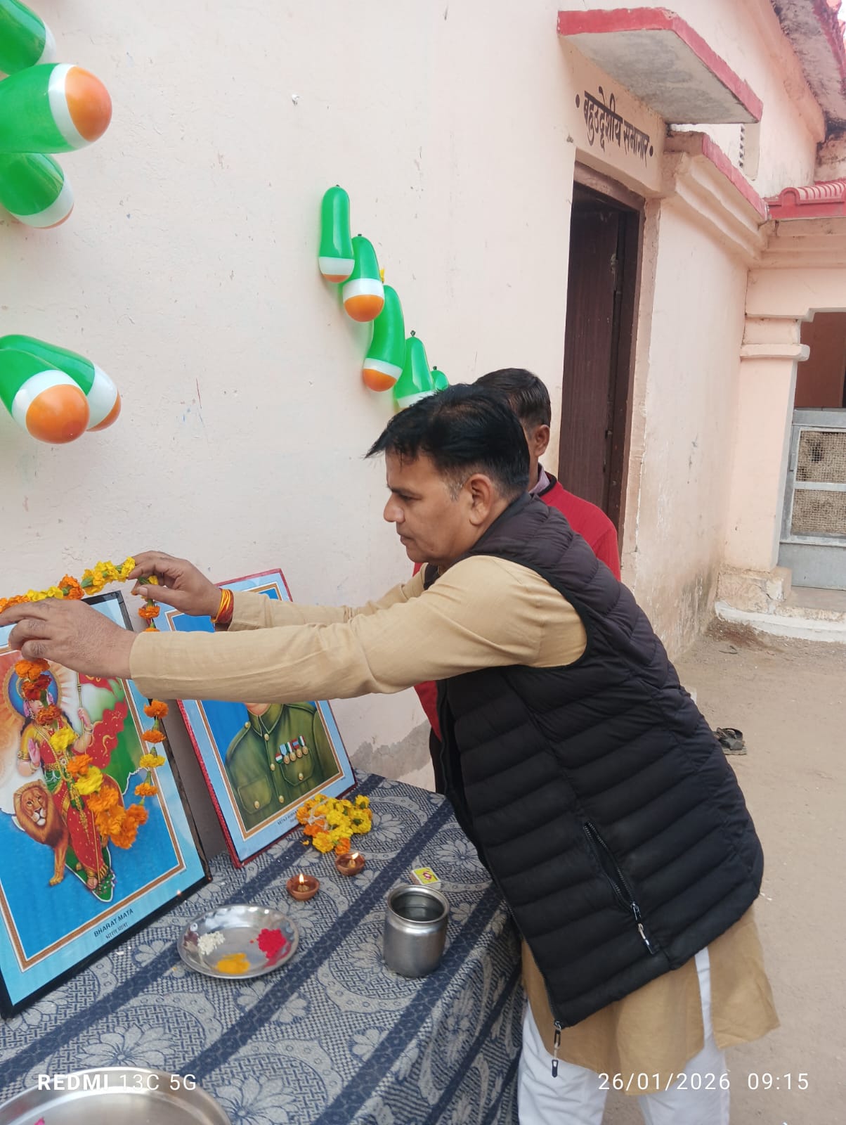 Offering a garland to the Bharat Mata and Netaji Subhas Chandra Bose portraits on Republic Day